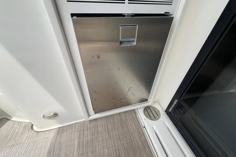 Slide: The Image of Stainless steel door on 2019 Carver C37 yacht interior. - 34