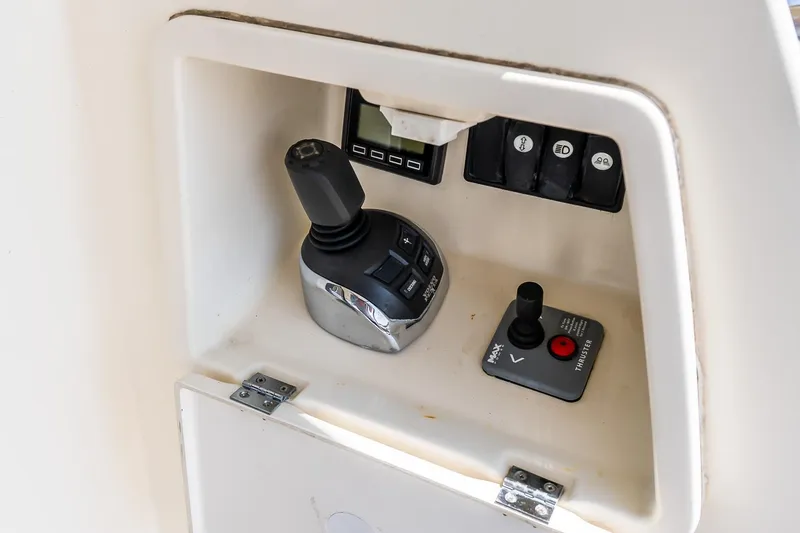 Slide: The Image of Control panel of a 2015 Prestige 450S yacht with joystick and switches. - 8