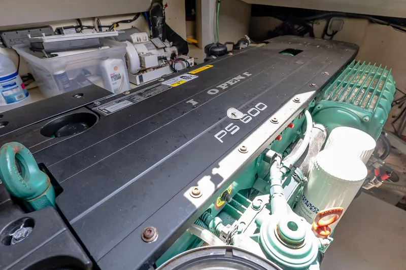 Slide: The Image of Engine compartment of a 2015 Prestige 450S yacht, featuring a PS600 engine. - 38