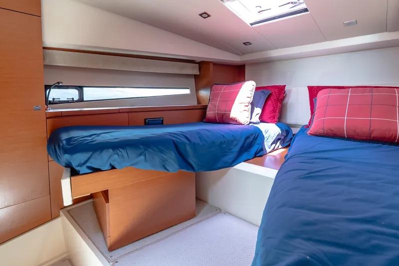 Slide: The Image of Luxurious cabin interior of 2015 Prestige 450S yacht with twin beds and skylight. - 32