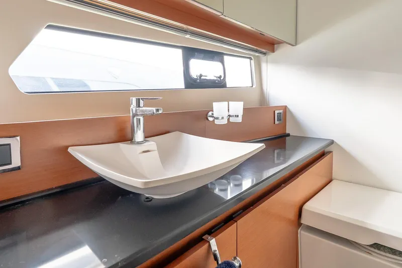 Slide: The Image of Modern bathroom sink in 2015 Prestige 450S yacht, featuring sleek design and elegant fixtures. - 30