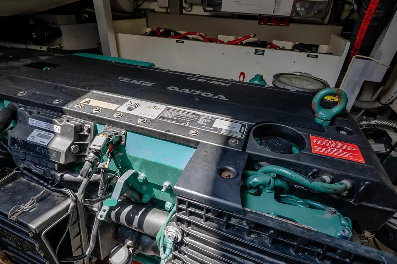 Slide: The Image of Engine compartment of a 2015 Prestige 450S boat, featuring a Volvo Penta engine. - 39