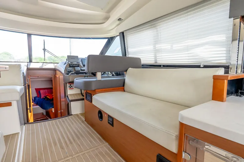 Slide: The Image of Interior of 2015 Prestige 450S yacht with modern seating and helm station. - 20