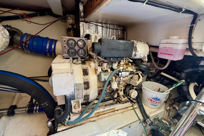 Slide: The Image of Engine room of a 1999 Ocean Yachts 45 Super Sport with Westerbeke generator. - 31