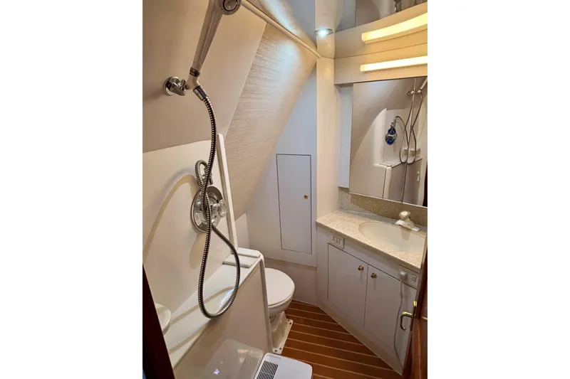 Slide: The Image of Bathroom interior of 1999 Ocean Yachts 45 Super Sport with shower and vanity. - 21