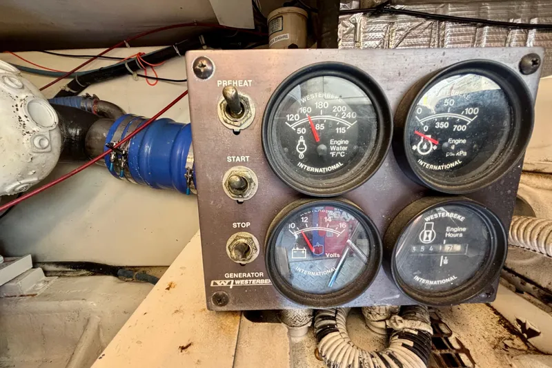 Slide: The Image of Control panel of a 1999 Ocean Yachts 45 Super Sport with gauges and switches. - 32