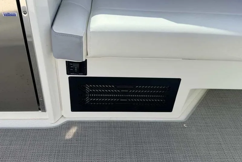 Slide: The Image of 2022 Formula 330 Crossover Bowrider I/O interior seating and vent detail. - 20