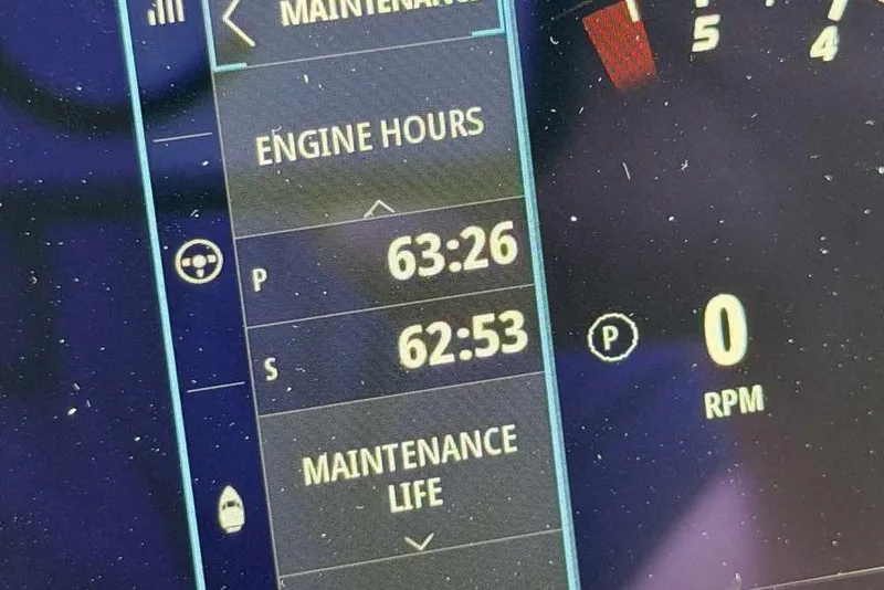 Slide: The Image of Dashboard display of 2022 Formula 330 Crossover Bowrider I/O showing engine hours and RPM. - 30