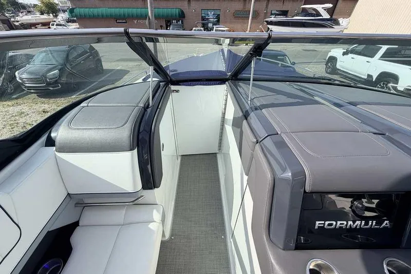 Slide: The Image of 2022 Formula 330 Crossover Bowrider I/O interior with sleek seating and modern design. - 39