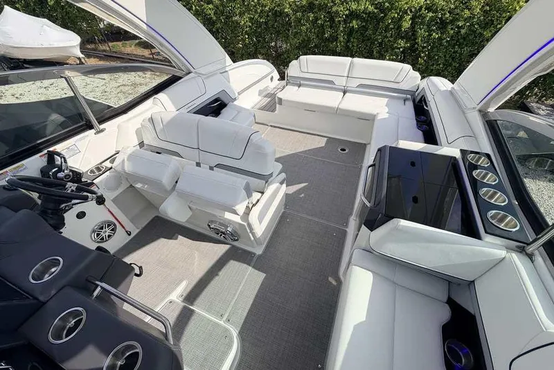 Slide: The Image of 2022 Formula 330 Crossover Bowrider I/O interior with luxurious seating and modern helm. - 24