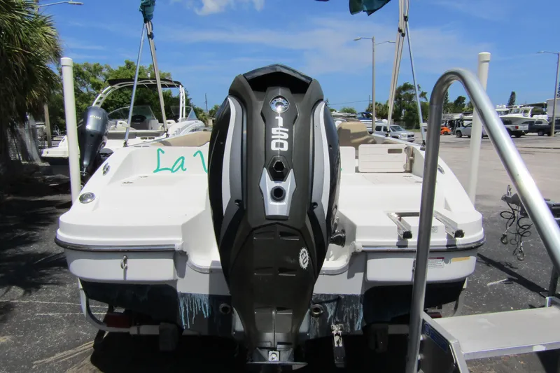 Slide: The Image of 2017 SMOKERCRAFT MDX 191 boat with 150 HP engine, docked outdoors. - 5