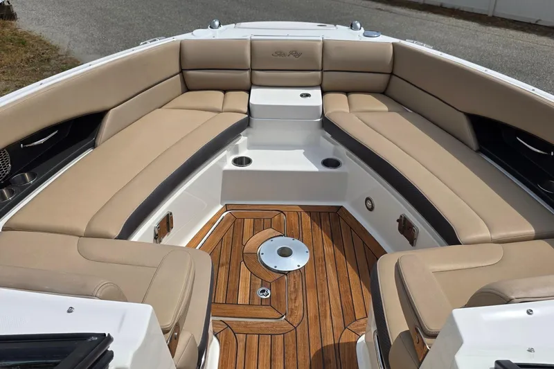 Slide: The Image of Luxurious seating area on a 2016 Sea Ray SLX 350 boat with teak flooring. - 5