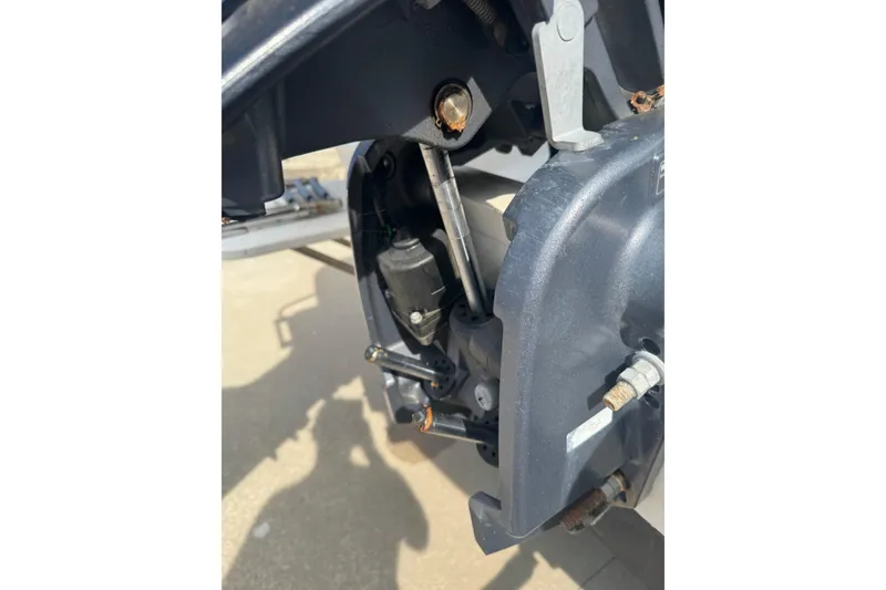 Slide: The Image of Close-up of a 2014 Carolina Skiff 198 DLV boat motor components. - 4