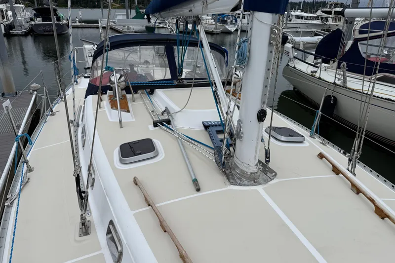 Slide: The Image of Sailboat deck view of 2000 Tartan 3700 model docked at marina. - 6