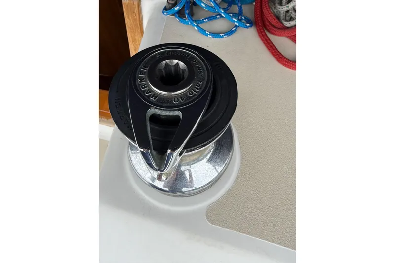Slide: The Image of Winch on Tartan 3700 sailboat, 2000 model, with ropes in background. - 39