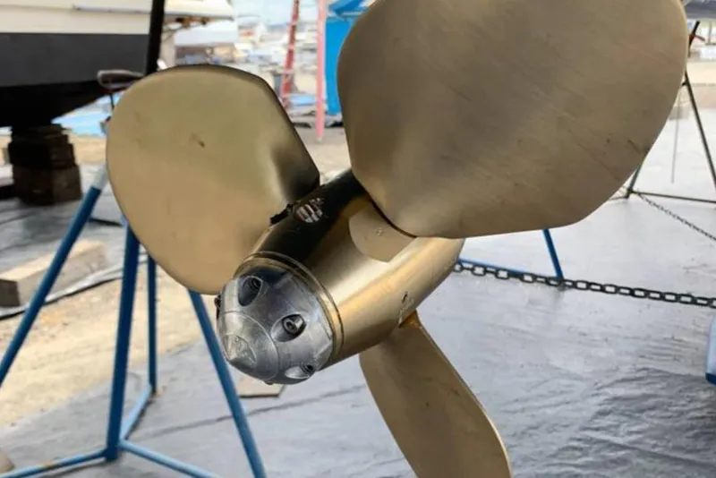 Slide: The Image of Close-up of a Tartan 3700 boat propeller, year 2000, in a shipyard setting. - 33