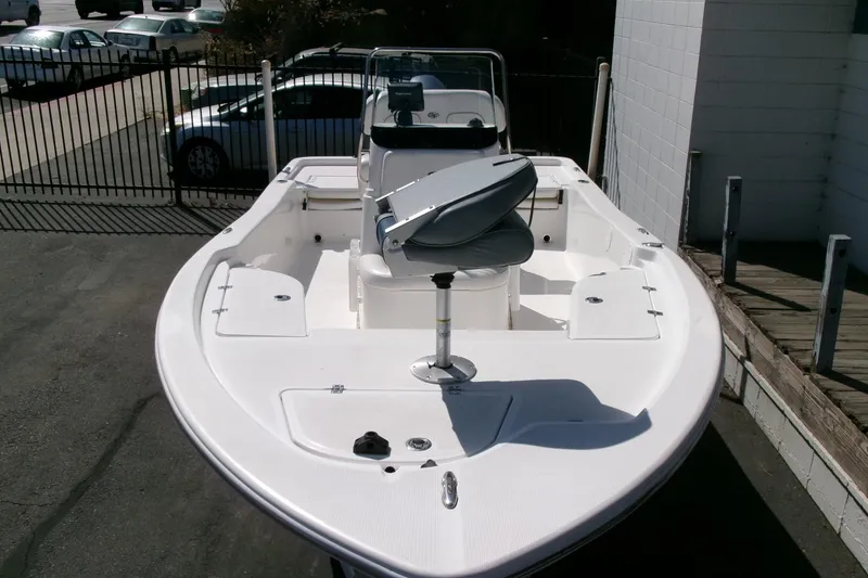 Slide: The Image of 2015 Sea Fox 180 Viper boat with seating, parked outdoors. - 24