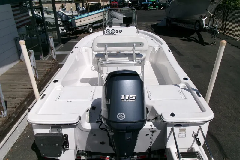 Slide: The Image of 2015 Sea Fox 180 Viper boat with Yamaha 115 engine, parked outdoors. - 25
