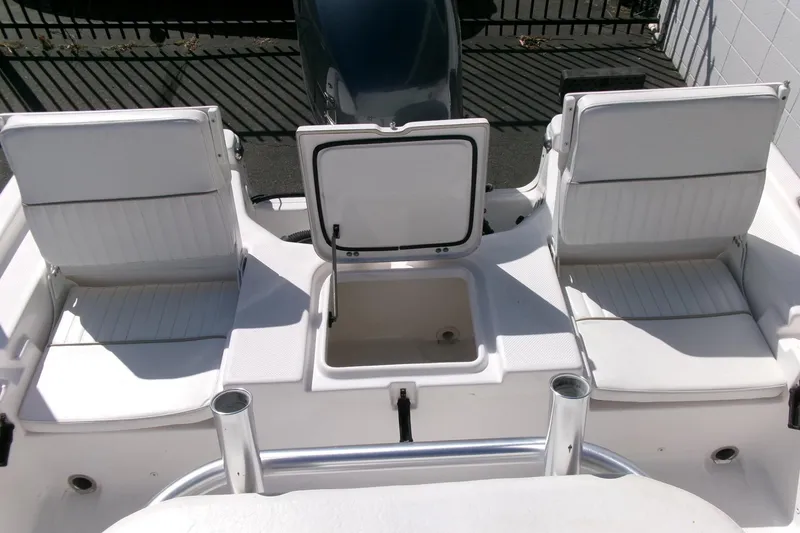 Slide: The Image of 2015 Sea Fox 180 Viper boat interior with open storage compartment and seating. - 18