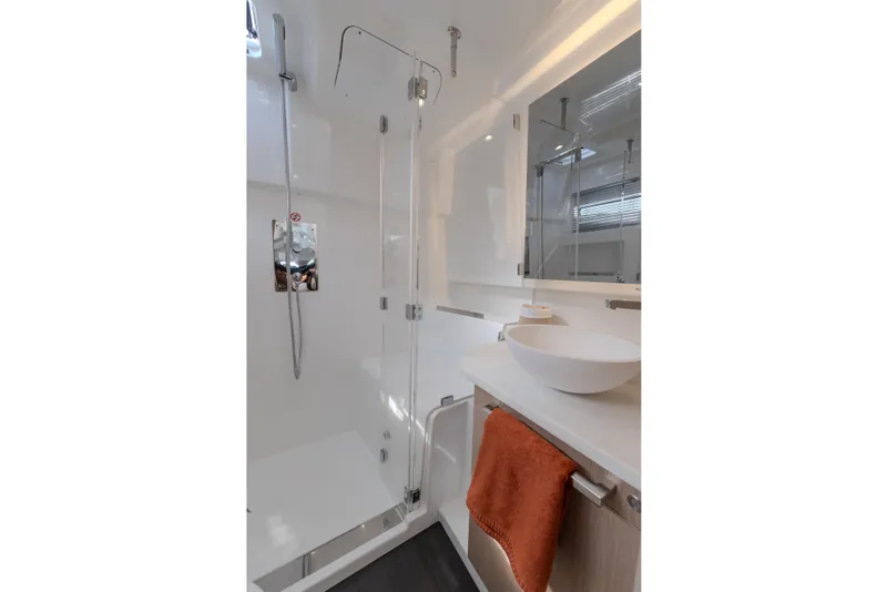 Slide: The Image of Modern bathroom in 2026 Jeanneau TH38 yacht with sleek shower and stylish basin. - 5