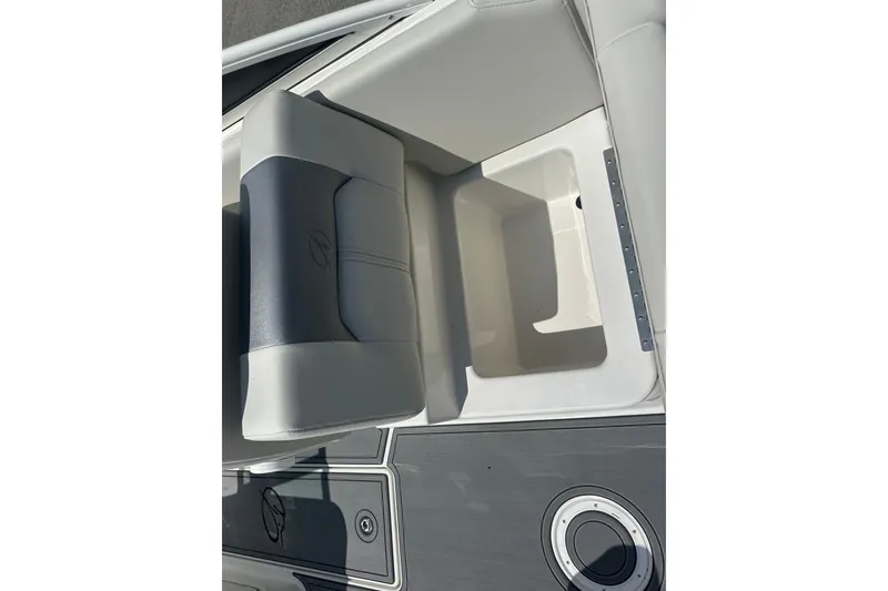 Slide: The Image of Interior view of 2026 Sailfish 236 DC boat seat and storage compartment. - 24