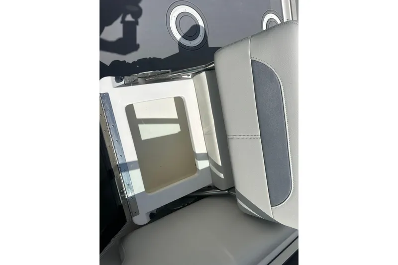 Slide: The Image of 2026 Sailfish 236 DC boat seat with storage compartment, showcasing modern design and functionality. - 27