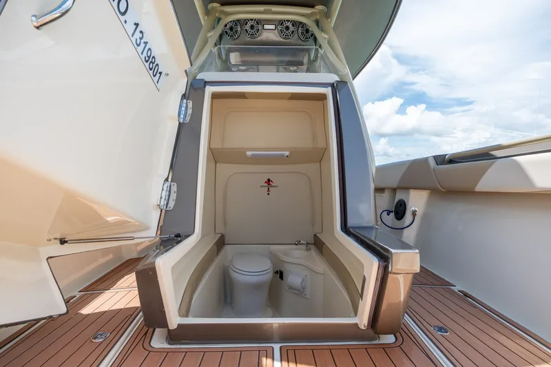 Slide: The Image of 2015 Statement 380 Open boat with onboard toilet, open hatch, and teak deck. - 33