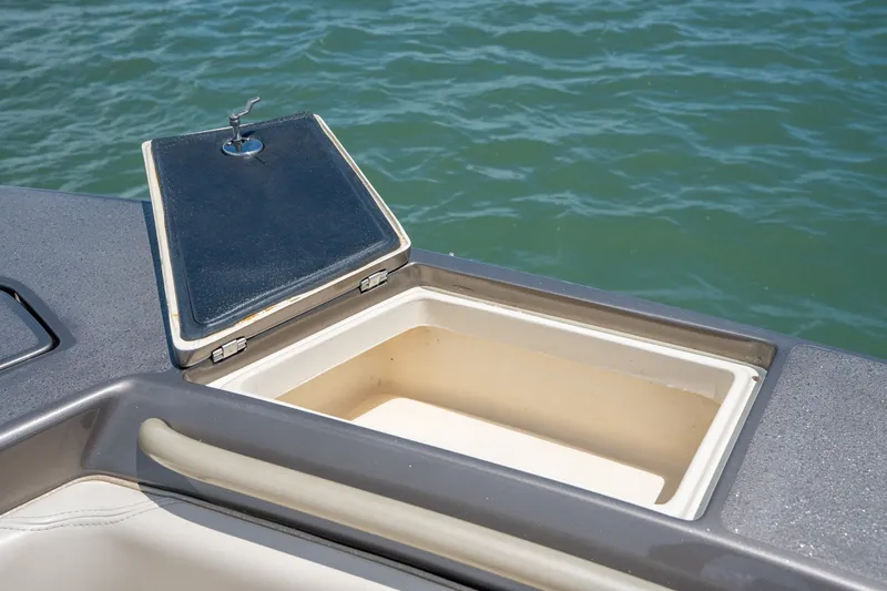 Slide: The Image of Open storage compartment on 2015 Statement 380 Open boat, with ocean background. - 32