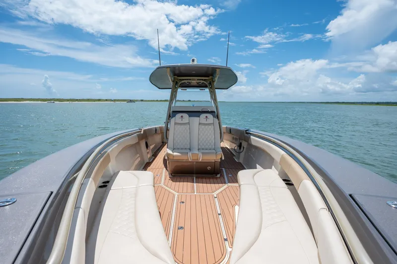 Slide: The Image of Luxury 2015 Statement 380 Open boat interior with elegant seating on open water. - 29