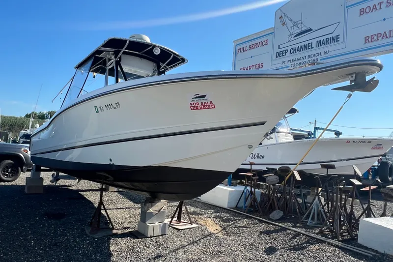 The Image of 2002 Triton 2895 CC boat for sale at Deep Channel Marine, Point Pleasant Beach. - 0