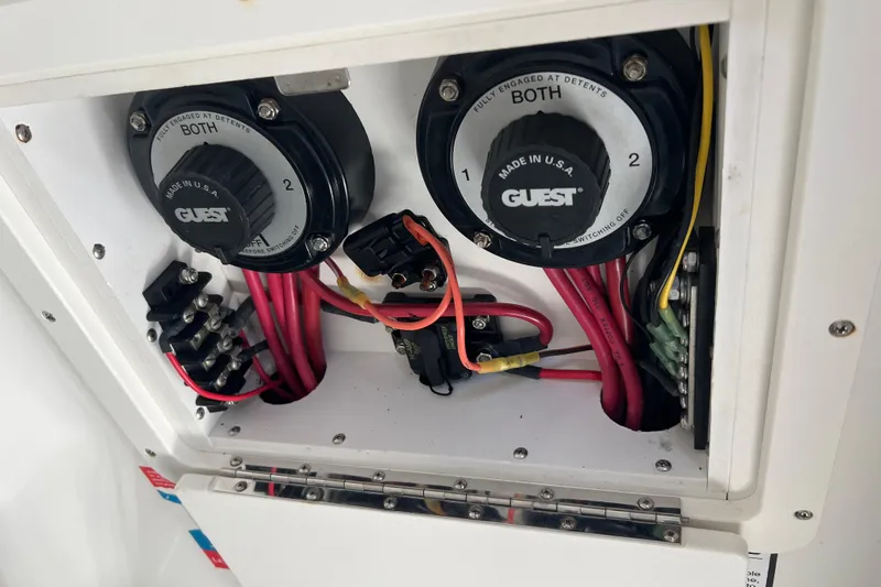 Slide: The Image of Electrical panel of a 2002 Triton 2895 CC boat with dual battery switches. - 20