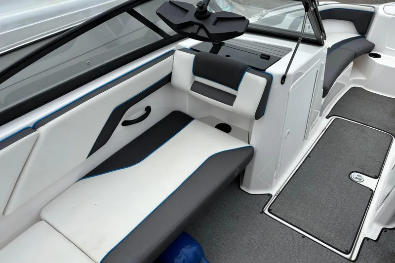Slide: The Image of 2020 Yamaha Boats AR210 interior with sleek seating and modern design. - 3