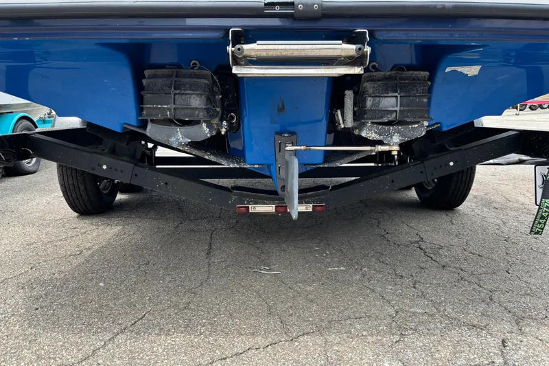 Slide: The Image of Rear view of a 2020 Yamaha Boats AR210 on a trailer, showing the hull and trailer details. - 10