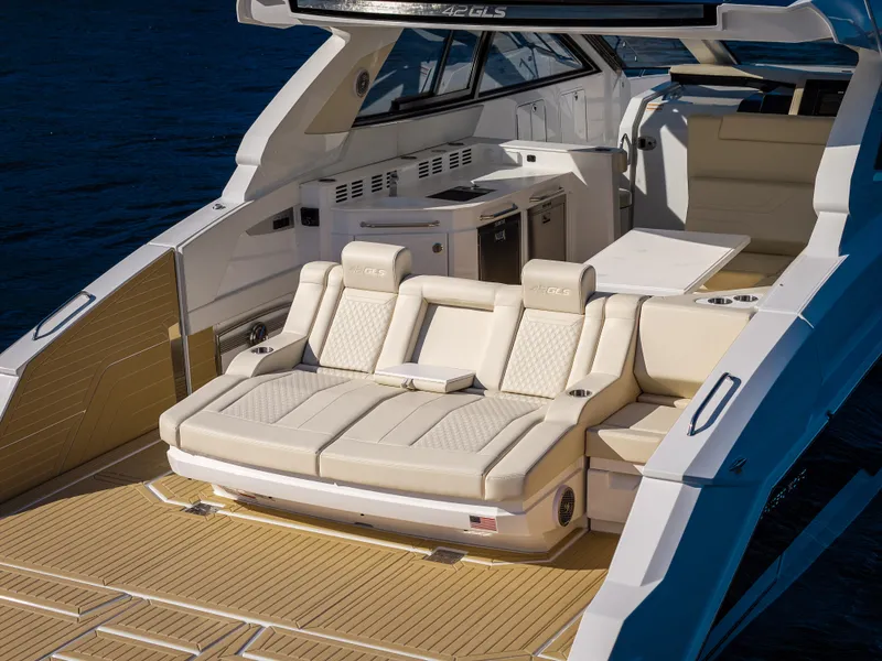 Slide: The Image of Luxurious Cruisers Yachts 42 GLS 2027 model with sleek seating and modern amenities. - 26