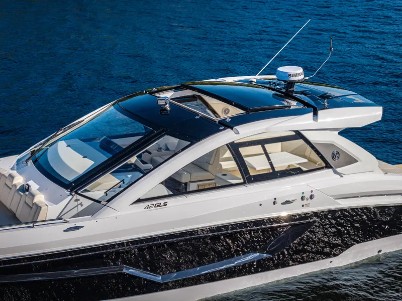 Slide: The Image of The 2027 Cruisers Yachts 42 GLS is a sleek motorboat with modern design and luxurious details. - 8
