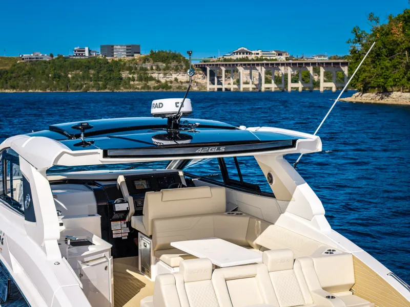 Slide: The Image of The 2027 Cruisers Yachts 42 GLS features a sleek design with a spacious cockpit and modern amenities. - 31