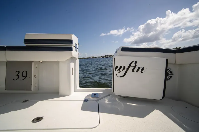 Slide: The Image of 2022 Yellowfin 39 Offshore boat interior with ocean view and clear sky. - 10
