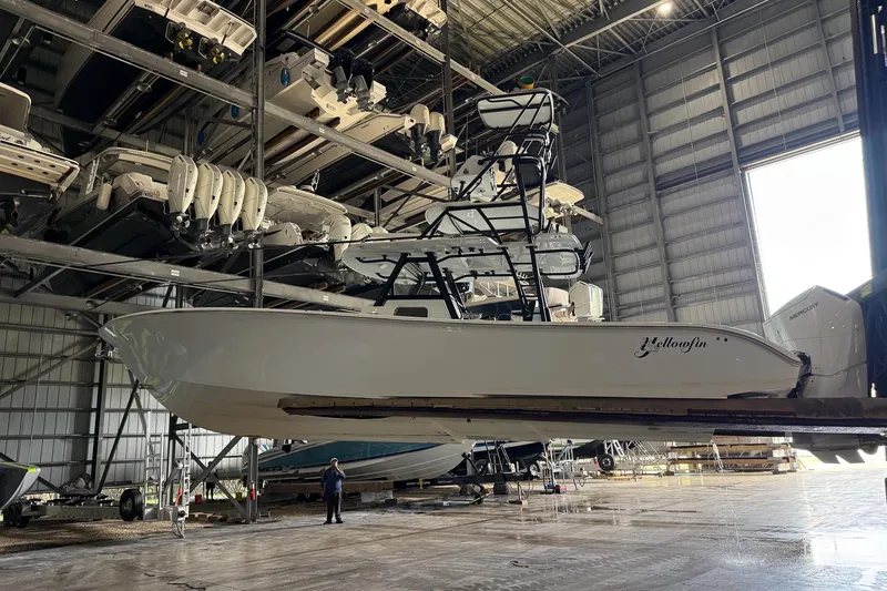 Slide: The Image of 2022 Yellowfin 39 Offshore boat in storage facility, elevated on racks. - 37