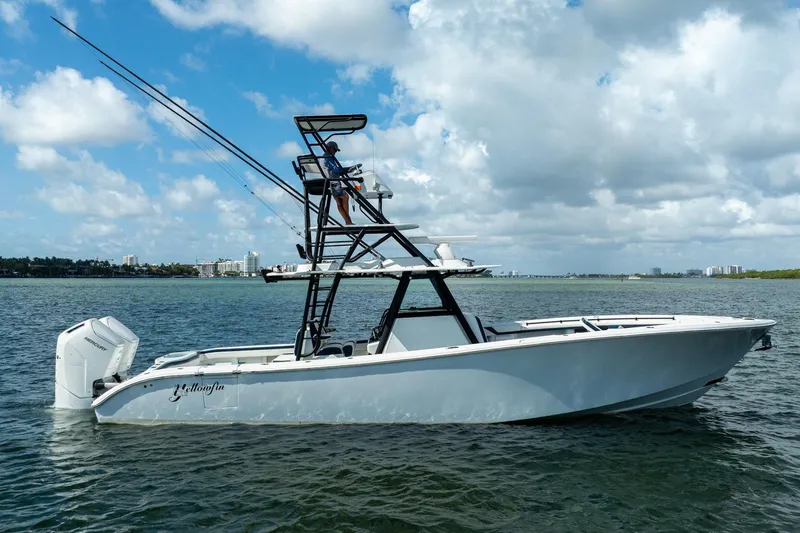 The Image of 2022 Yellowfin 39 Offshore boat on water under a partly cloudy sky. - 0