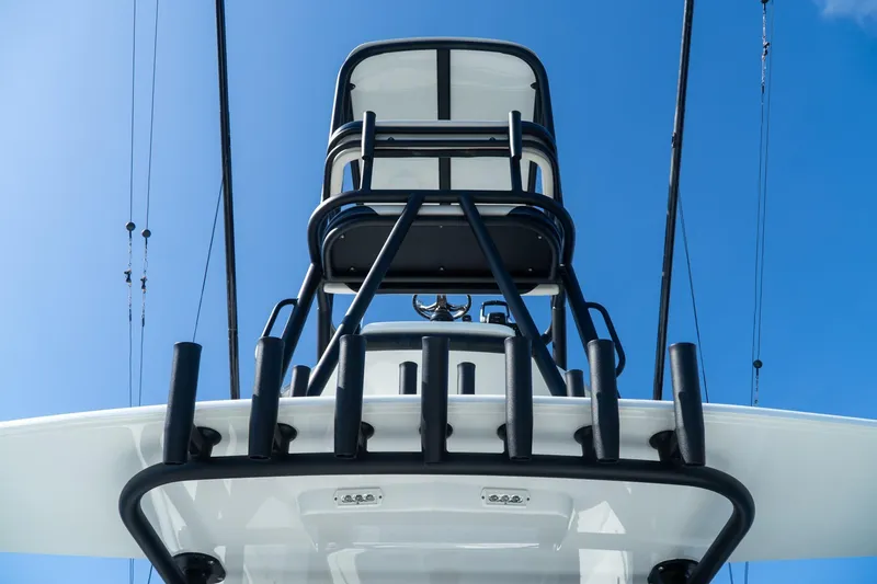 Slide: The Image of 2022 Yellowfin 39 Offshore boat tower against clear blue sky. - 13