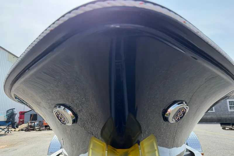 Slide: The Image of Close-up of 2027 Rossiter 14 boat hull with visible lights and sleek design. - 29