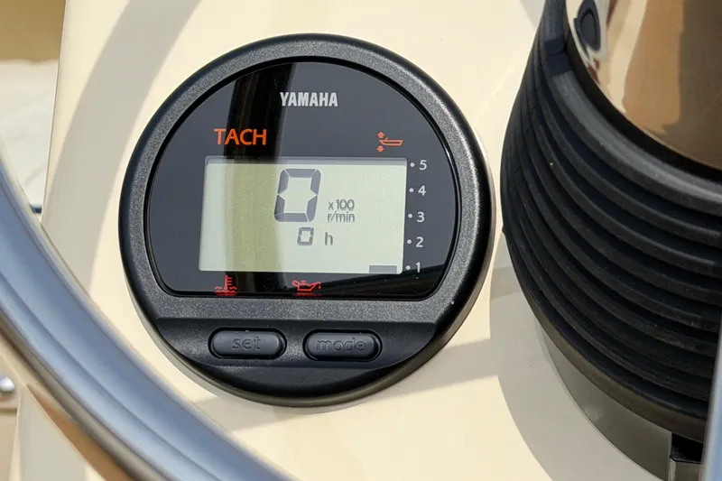 Slide: The Image of Yamaha tachometer on Rossiter 14 boat dashboard, displaying zero RPM, 2027 model. - 23