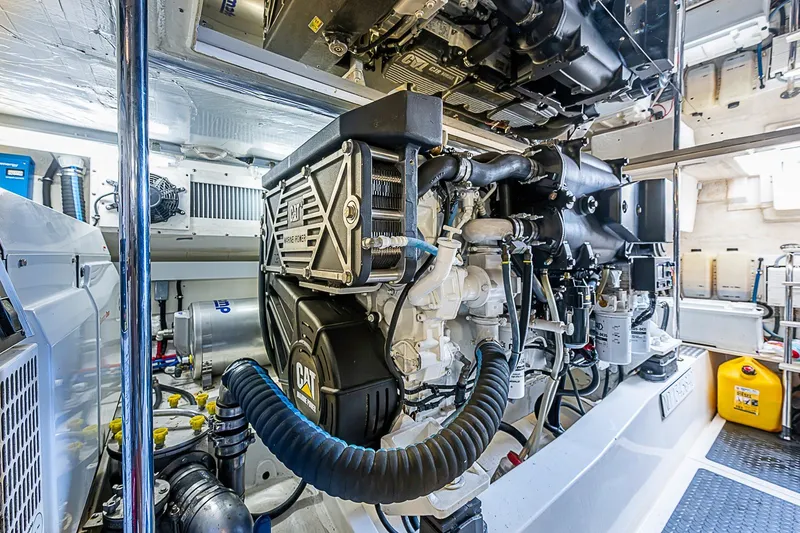 Slide: The Image of Engine room of 2009 Riviera 58 Flybridge yacht with CAT marine power engine. - 46