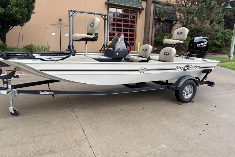 Slide: The Image of 2022 Tracker Bass Tracker Classic XL boat on trailer, parked outdoors. - 3