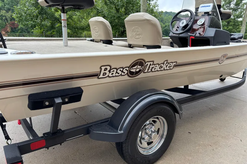 Slide: The Image of 2022 Tracker Bass Tracker Classic XL boat on trailer, featuring sleek design and comfortable seating. - 4