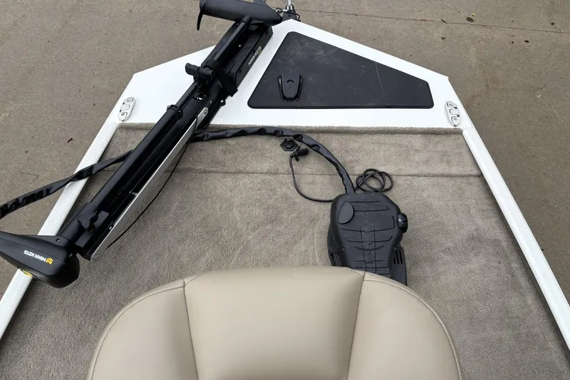 Slide: The Image of 2022 Tracker Bass Tracker Classic XL boat deck with trolling motor and beige seat. - 6