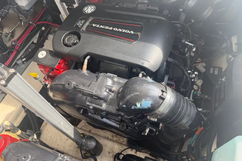 Slide: The Image of A Volvo Penta engine in a 2017 Regal 32 Express boat. - 34