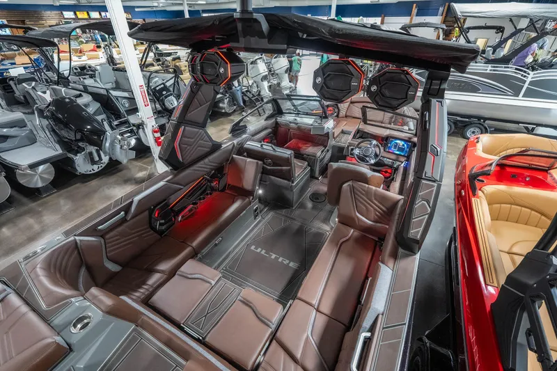 Slide: The Image of 2026 Tigé Ultré 25ZX boat interior with luxurious seating and advanced dashboard features. - 43