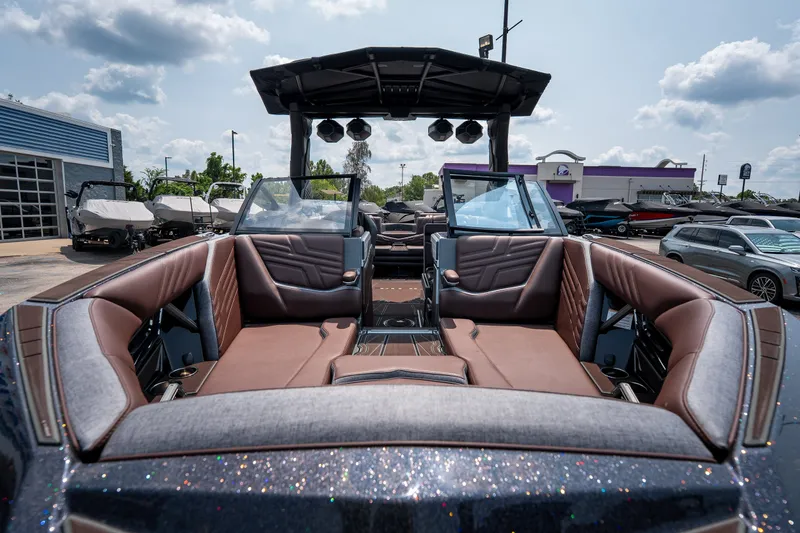 Slide: The Image of 2026 Tigé Ultré 25ZX boat interior with luxurious seating and modern design. - 30