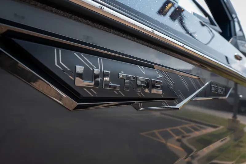 Slide: The Image of 2026 Tigé Ultré 25ZX boat emblem with sleek, modern design details. - 3